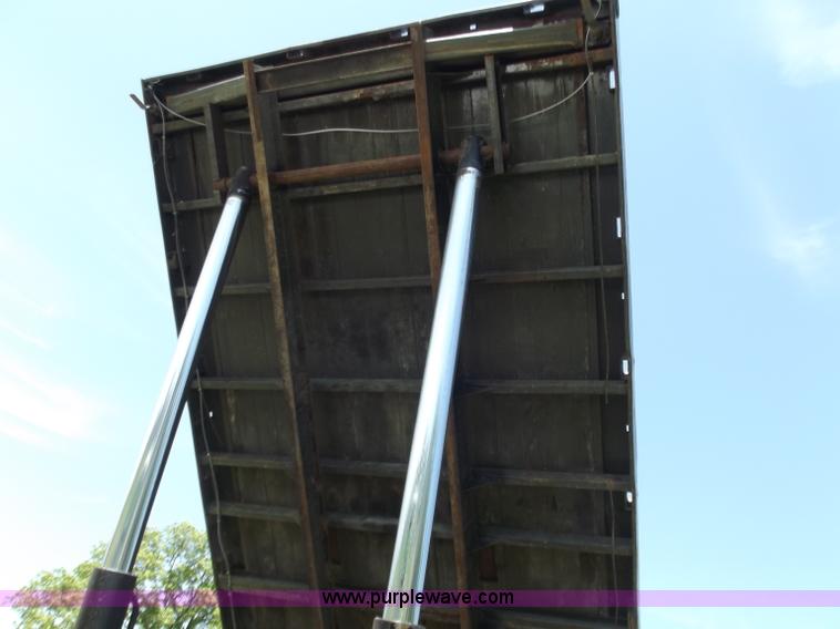 image for item C2024 1996 Ford LTA9000 AeroMax flatbed dump truck