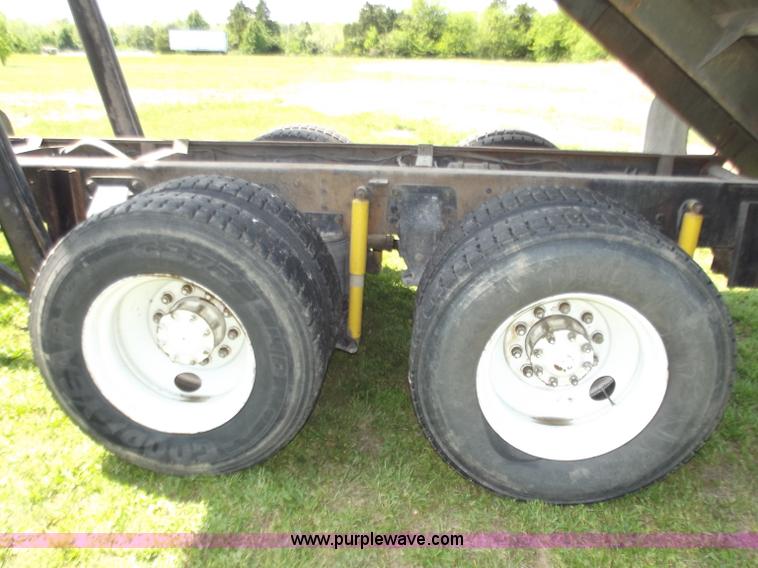 image for item C2024 1996 Ford LTA9000 AeroMax flatbed dump truck