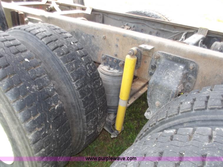 image for item C2024 1996 Ford LTA9000 AeroMax flatbed dump truck