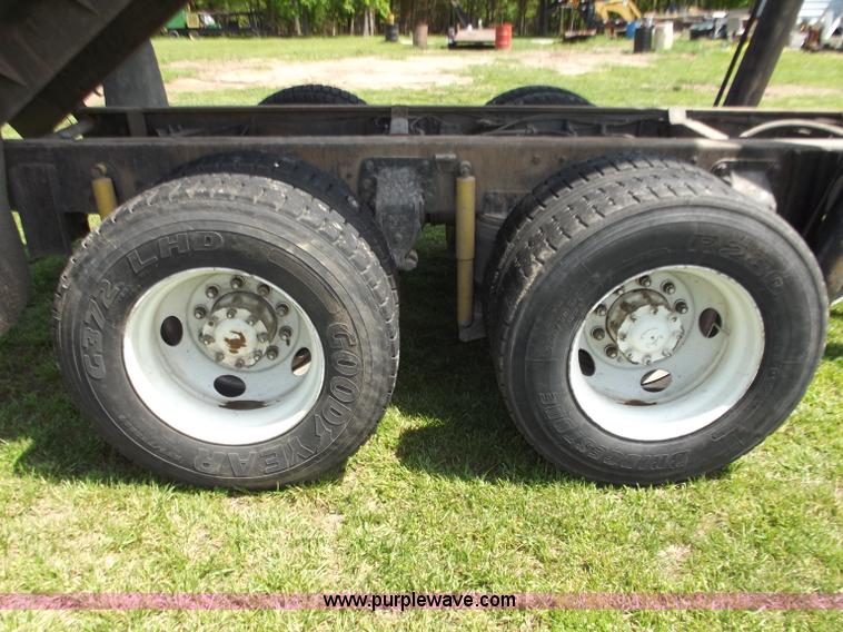 image for item C2024 1996 Ford LTA9000 AeroMax flatbed dump truck