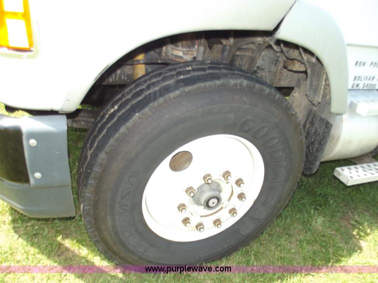 image for item C2024 1996 Ford LTA9000 AeroMax flatbed dump truck