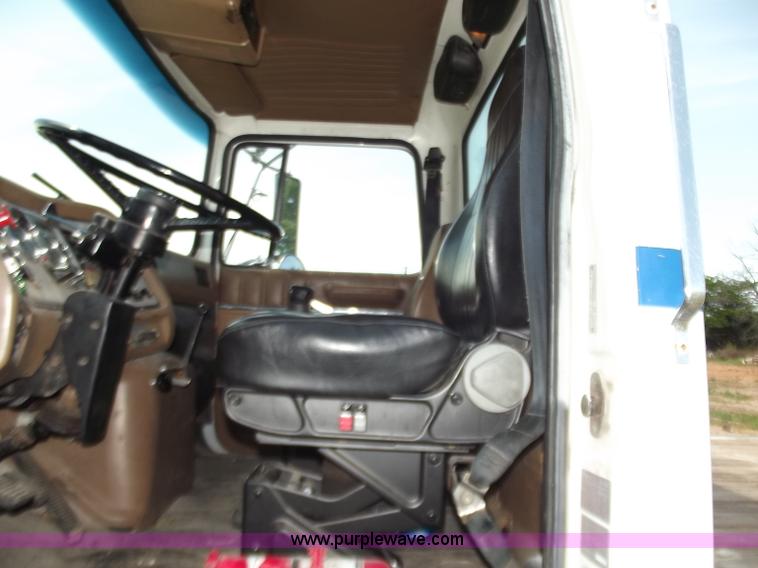 image for item C2024 1996 Ford LTA9000 AeroMax flatbed dump truck