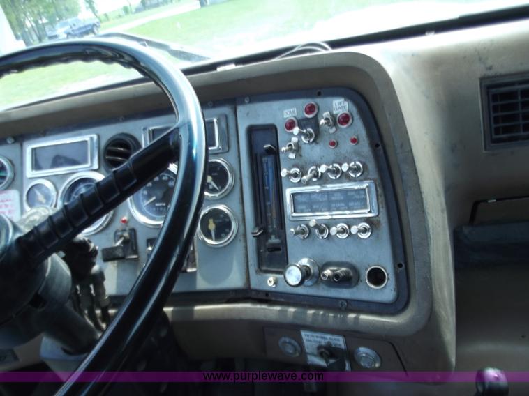 image for item C2024 1996 Ford LTA9000 AeroMax flatbed dump truck