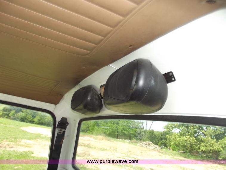 image for item C2024 1996 Ford LTA9000 AeroMax flatbed dump truck