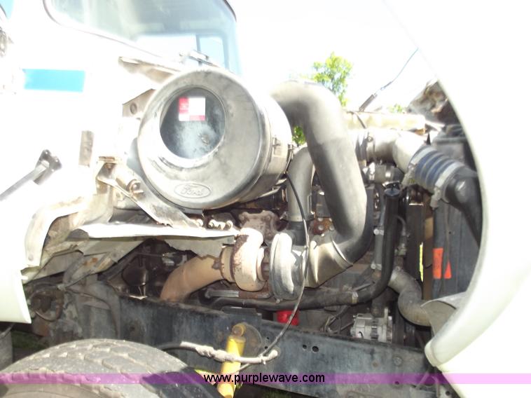 image for item C2024 1996 Ford LTA9000 AeroMax flatbed dump truck