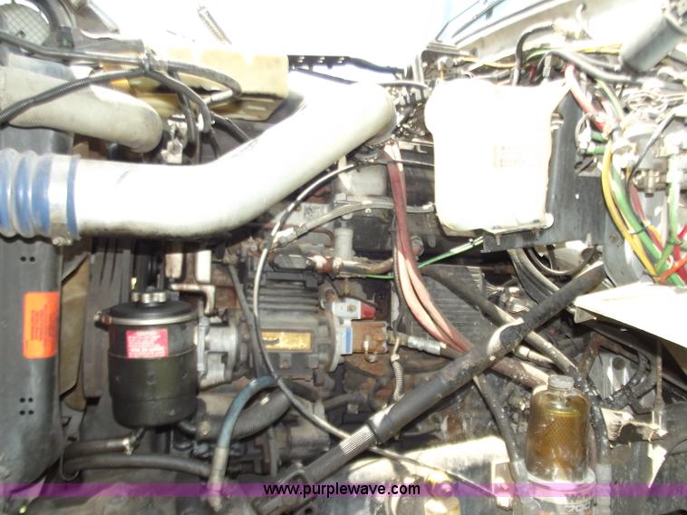 image for item C2024 1996 Ford LTA9000 AeroMax flatbed dump truck