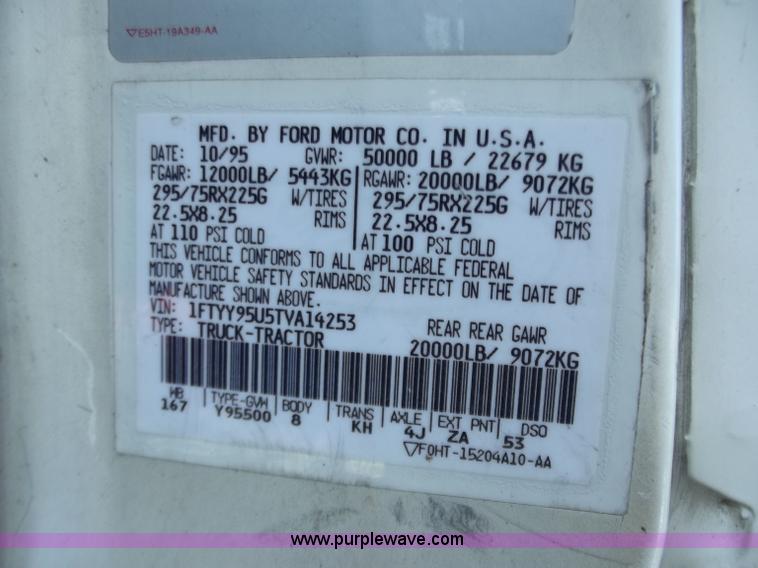 image for item C2024 1996 Ford LTA9000 AeroMax flatbed dump truck