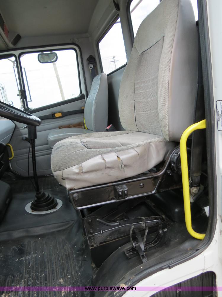 image for item B2279 1999 Freightliner FL80 semi truck