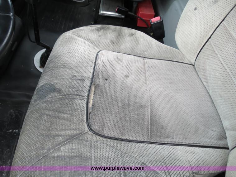 image for item B2279 1999 Freightliner FL80 semi truck