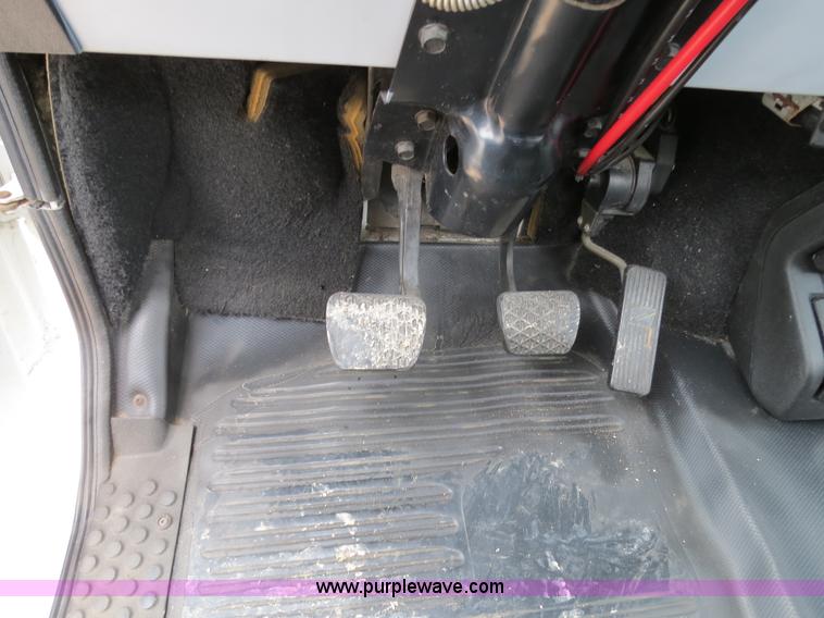 image for item B2279 1999 Freightliner FL80 semi truck