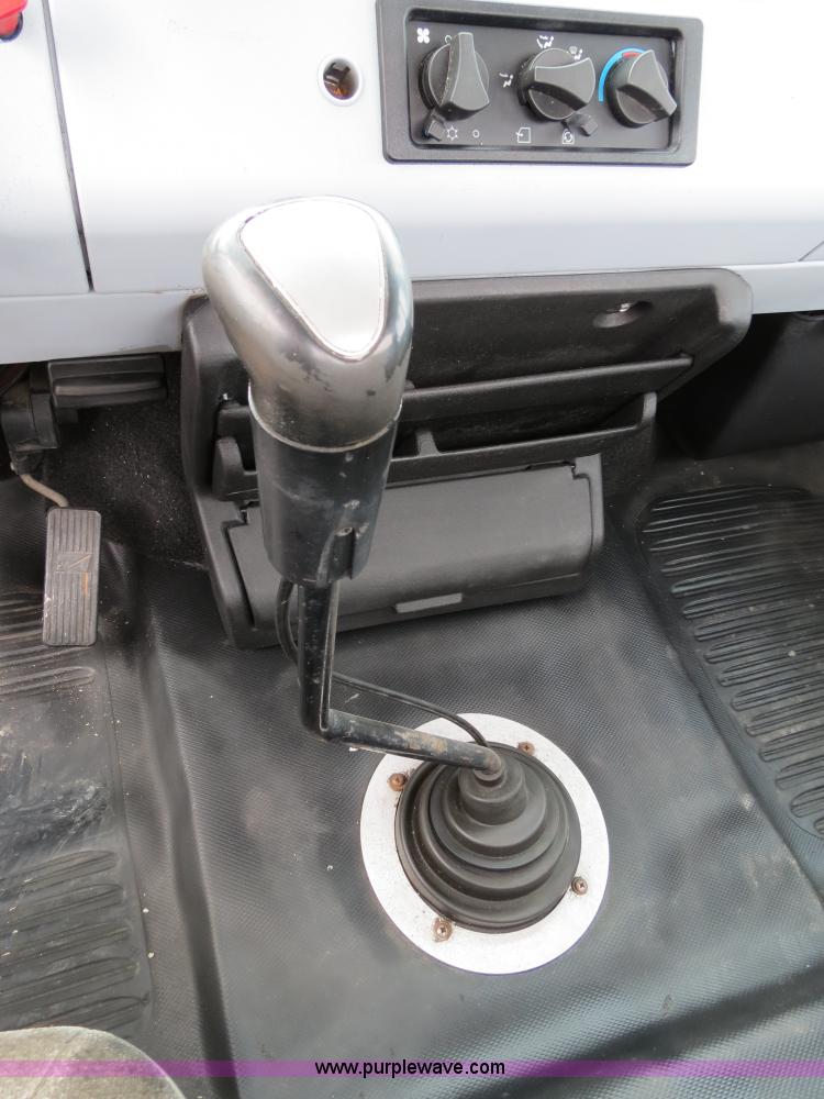 image for item B2279 1999 Freightliner FL80 semi truck