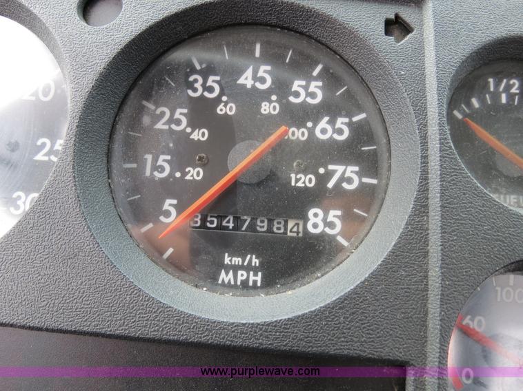 image for item B2279 1999 Freightliner FL80 semi truck