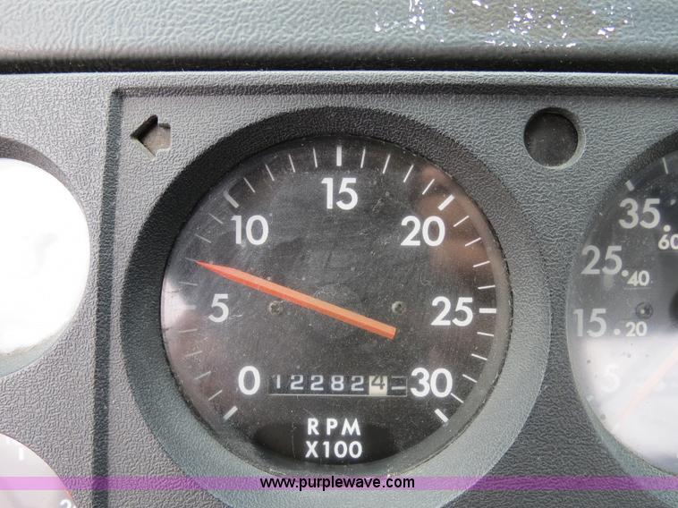 image for item B2279 1999 Freightliner FL80 semi truck