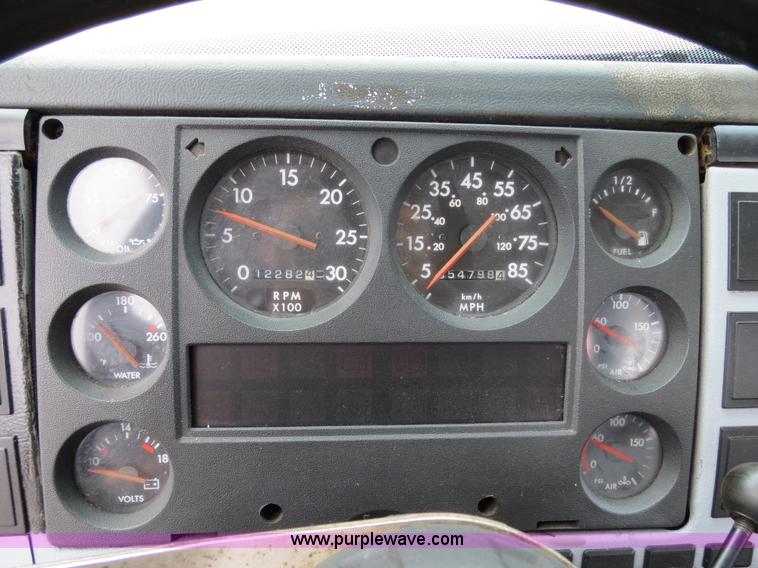 image for item B2279 1999 Freightliner FL80 semi truck