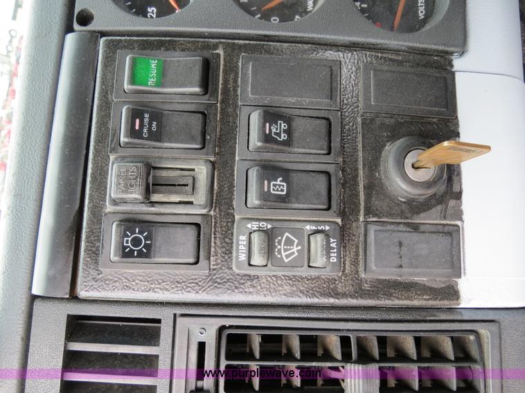 image for item B2279 1999 Freightliner FL80 semi truck