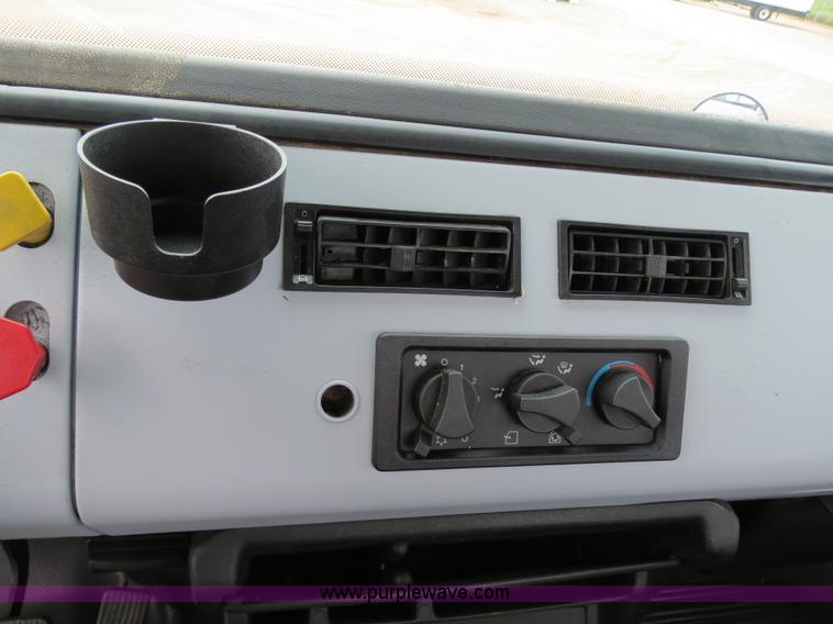 image for item B2279 1999 Freightliner FL80 semi truck