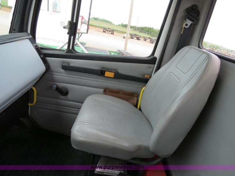 image for item B2279 1999 Freightliner FL80 semi truck