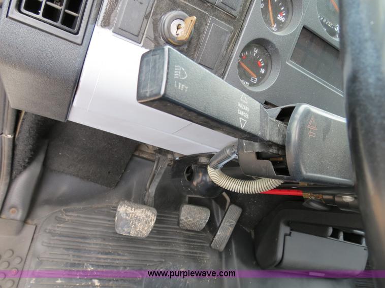 image for item B2279 1999 Freightliner FL80 semi truck