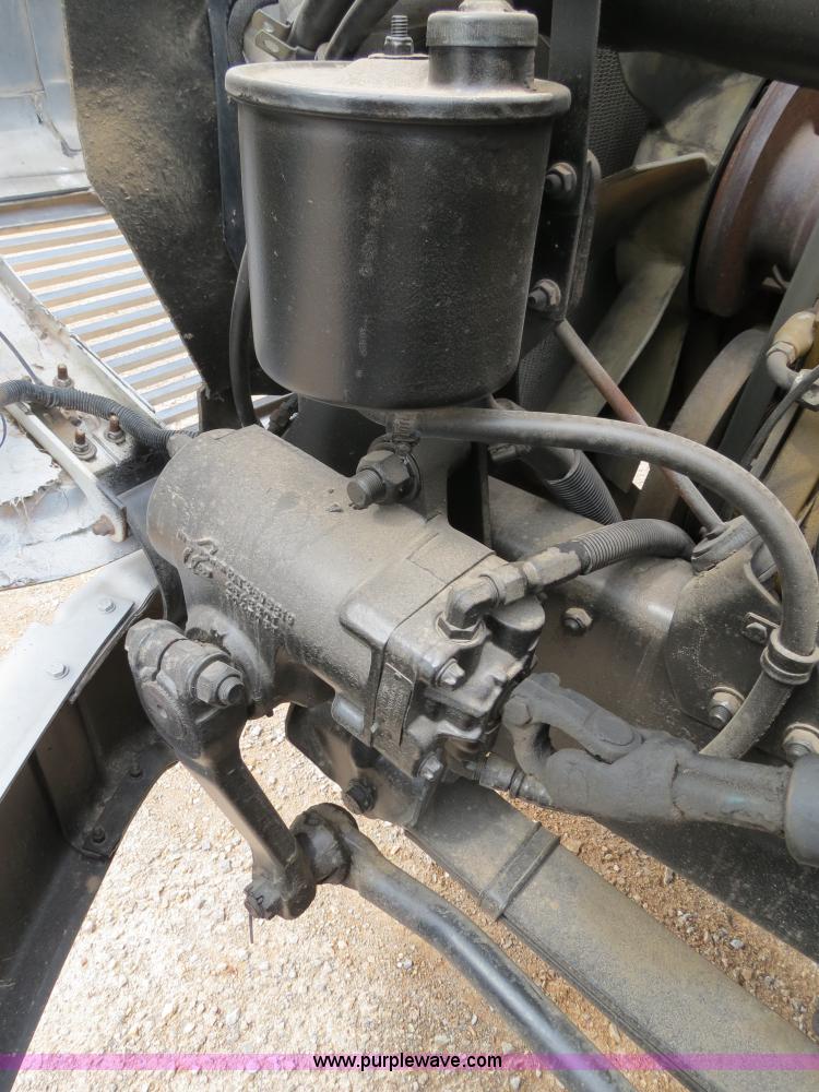 image for item B2279 1999 Freightliner FL80 semi truck