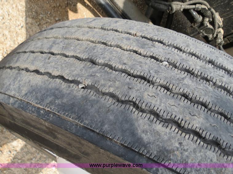 image for item B2279 1999 Freightliner FL80 semi truck