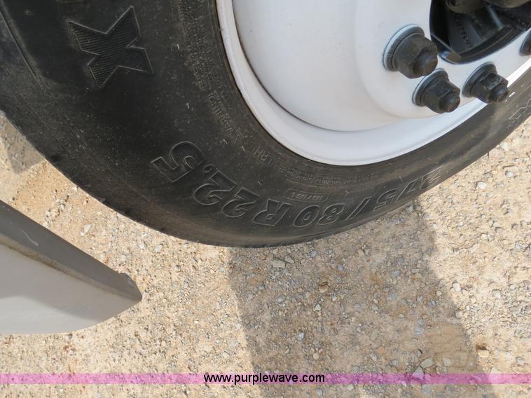 image for item B2279 1999 Freightliner FL80 semi truck