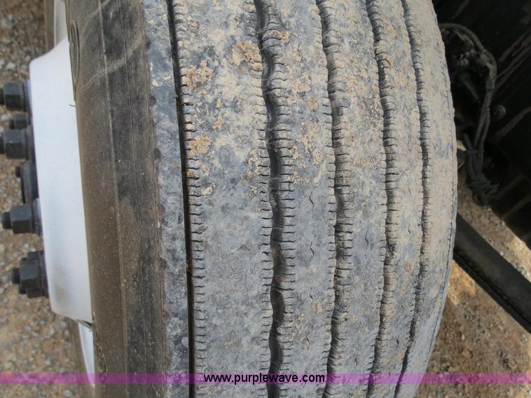 image for item B2279 1999 Freightliner FL80 semi truck