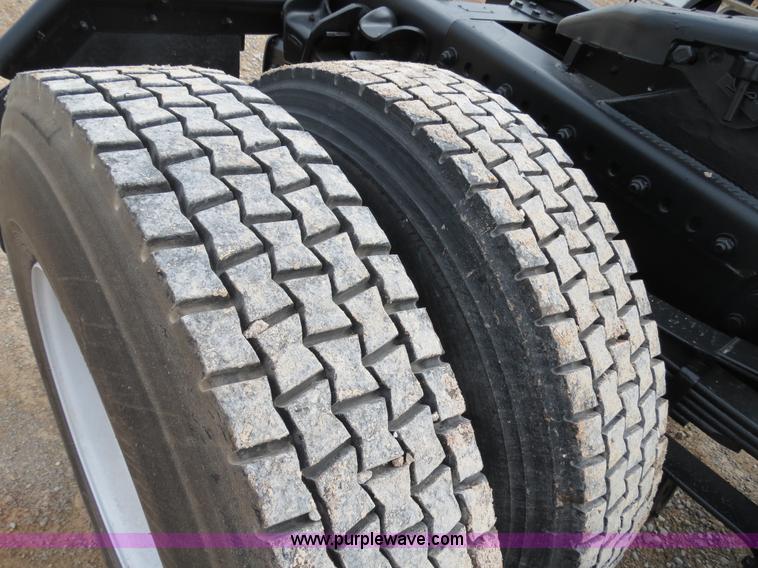 image for item B2279 1999 Freightliner FL80 semi truck