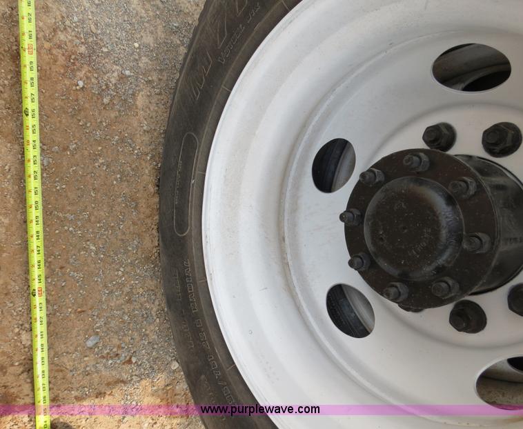 image for item B2279 1999 Freightliner FL80 semi truck