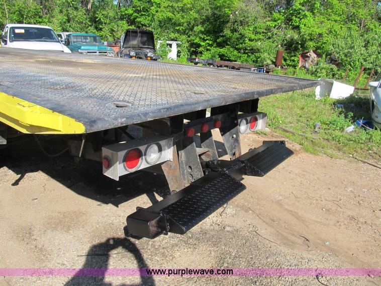 image for item B2691 1997 Peterbilt 330 roll back truck