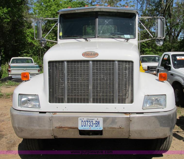 image for item B2691 1997 Peterbilt 330 roll back truck
