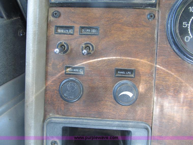 image for item B2691 1997 Peterbilt 330 roll back truck