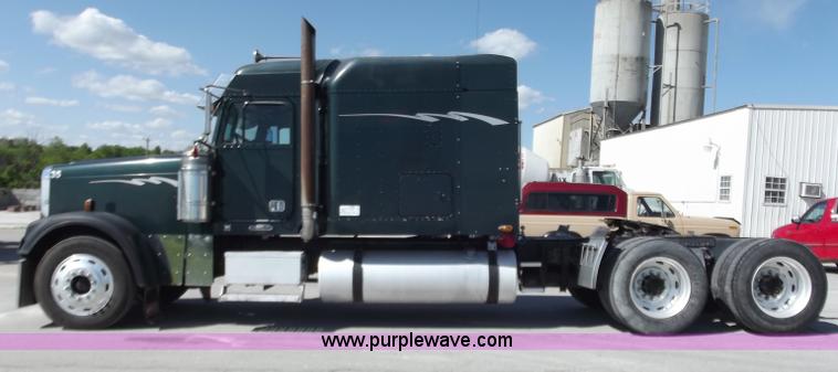 image for item C2002 1999 Freightliner FLD120 semi truck