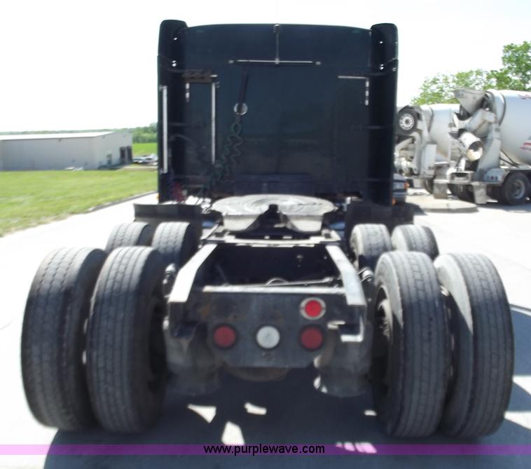 image for item C2002 1999 Freightliner FLD120 semi truck