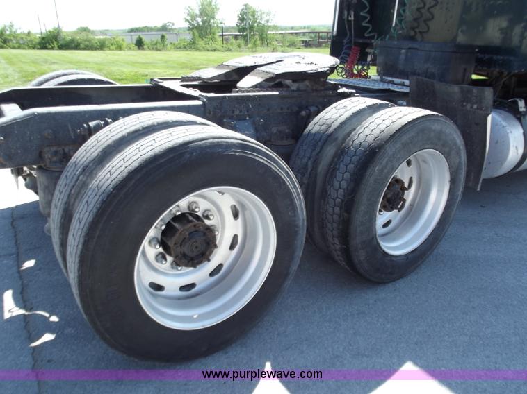 image for item C2002 1999 Freightliner FLD120 semi truck