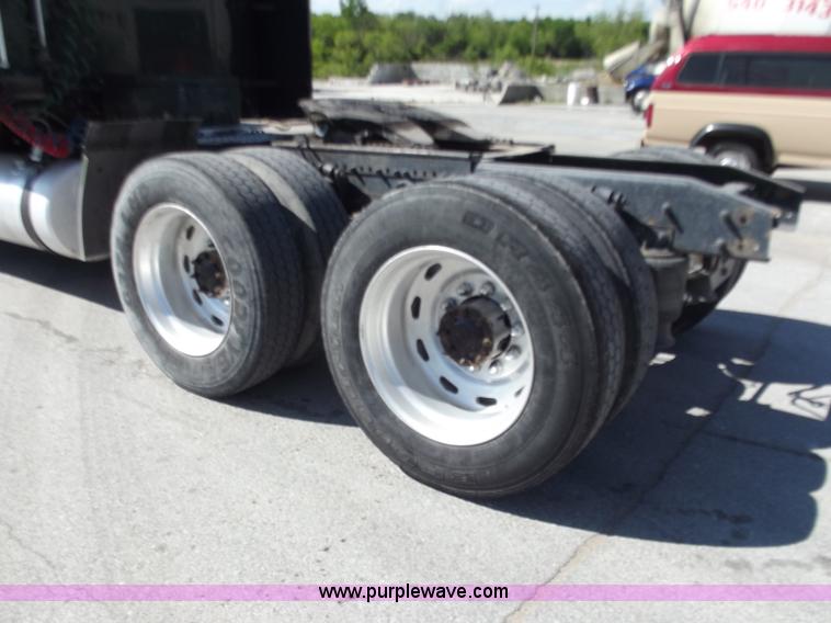 image for item C2002 1999 Freightliner FLD120 semi truck