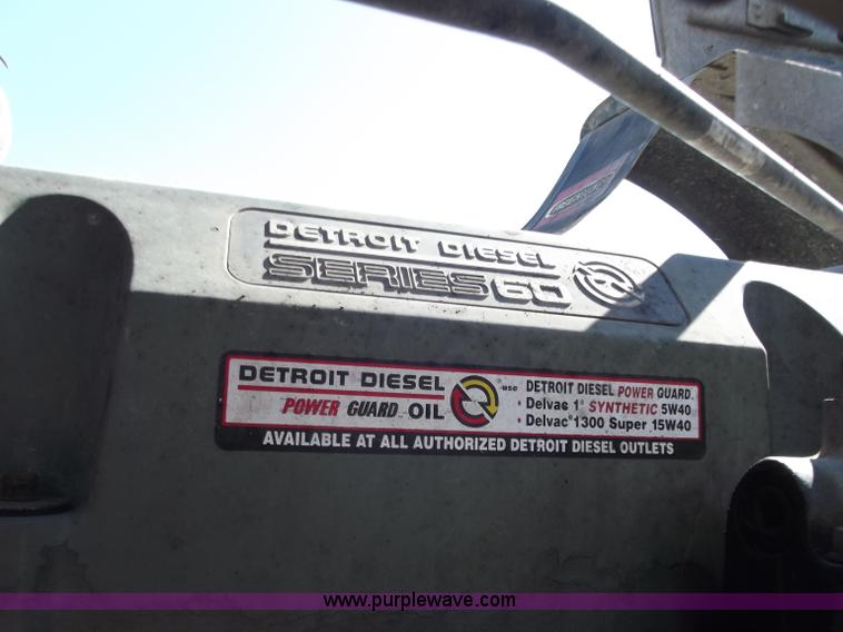 image for item C2002 1999 Freightliner FLD120 semi truck