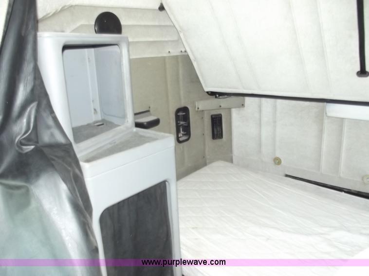 image for item C2002 1999 Freightliner FLD120 semi truck