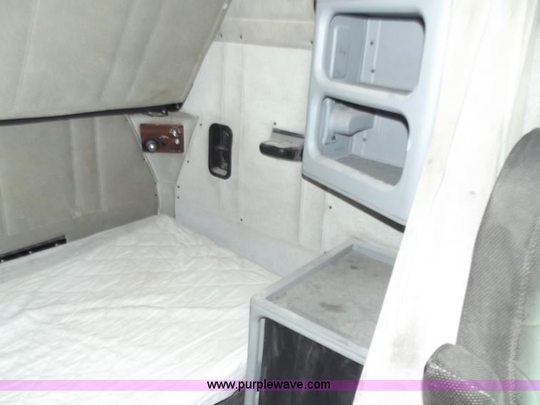 image for item C2002 1999 Freightliner FLD120 semi truck