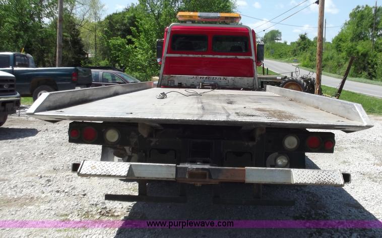 image for item C2014 1998 Freightliner FL60 business class roll back extended cab truck