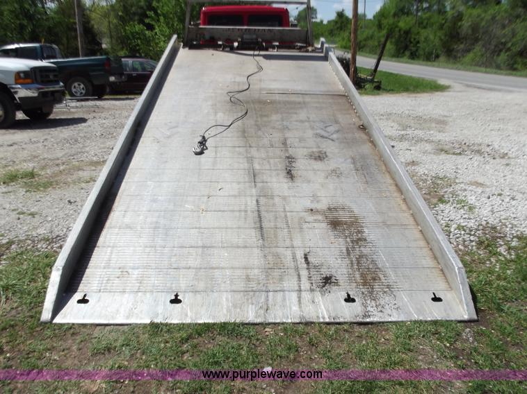 image for item C2014 1998 Freightliner FL60 business class roll back extended cab truck