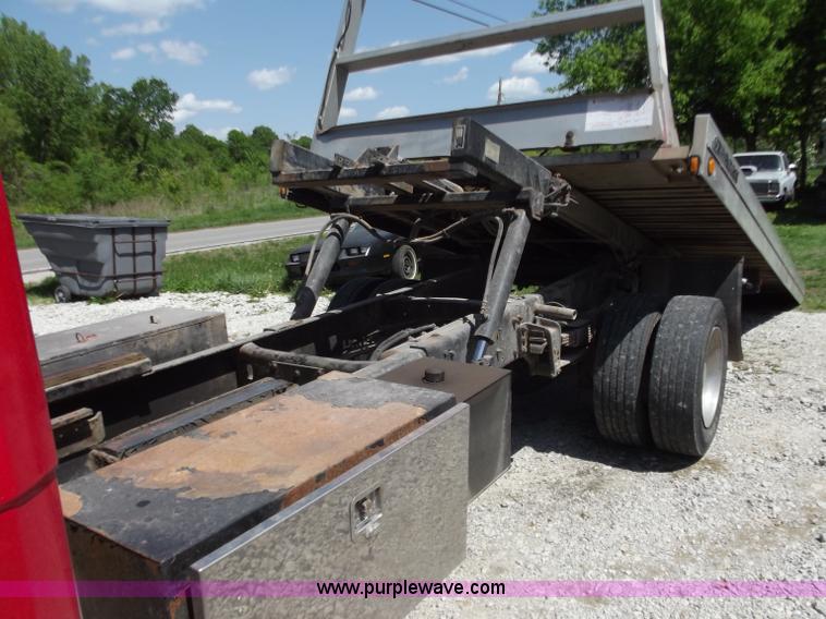 image for item C2014 1998 Freightliner FL60 business class roll back extended cab truck