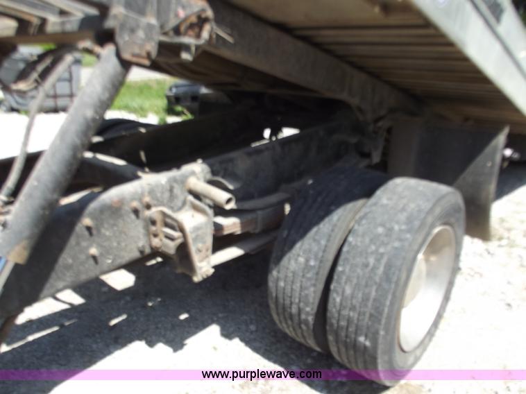 image for item C2014 1998 Freightliner FL60 business class roll back extended cab truck