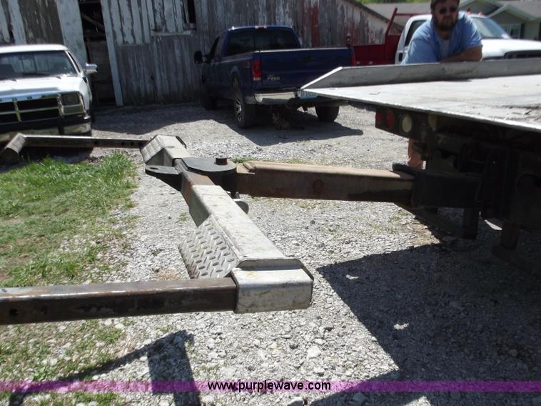 image for item C2014 1998 Freightliner FL60 business class roll back extended cab truck