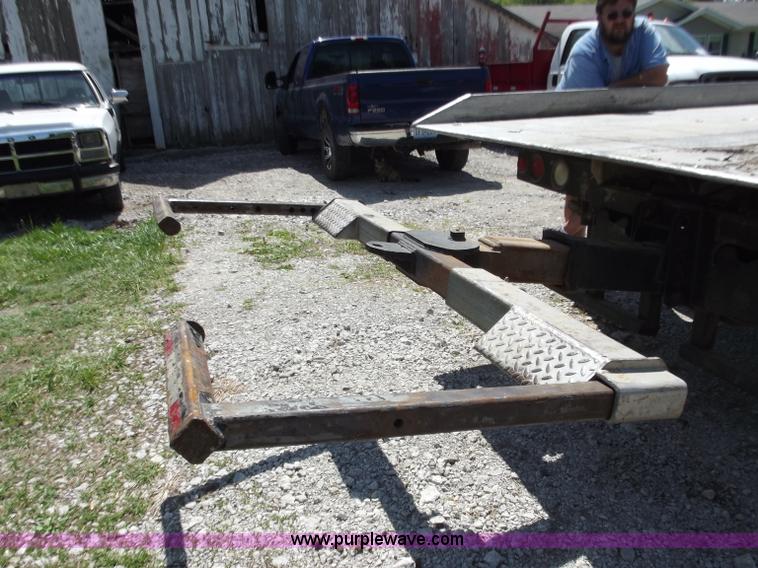 image for item C2014 1998 Freightliner FL60 business class roll back extended cab truck