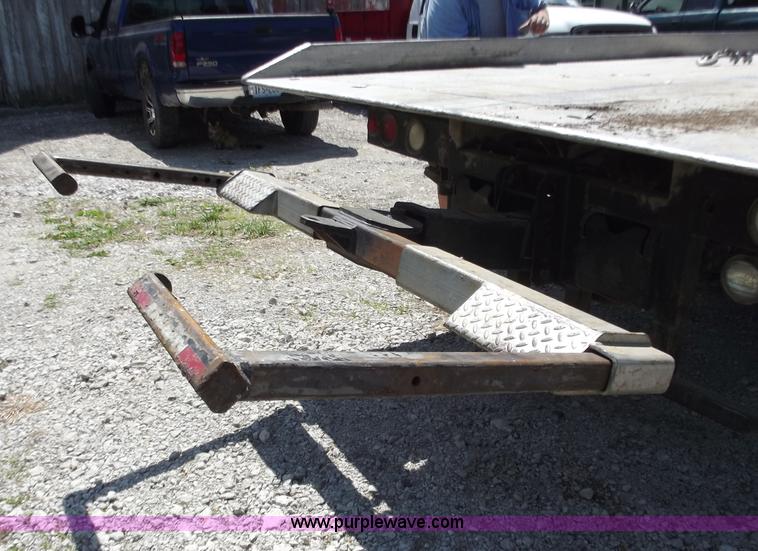 image for item C2014 1998 Freightliner FL60 business class roll back extended cab truck