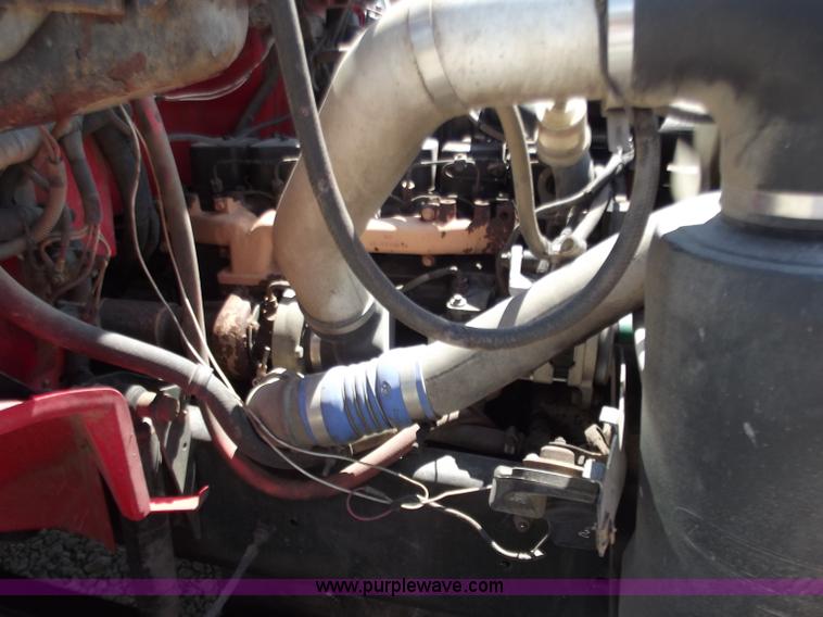 image for item C2014 1998 Freightliner FL60 business class roll back extended cab truck