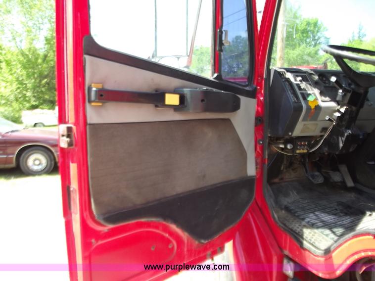 image for item C2014 1998 Freightliner FL60 business class roll back extended cab truck