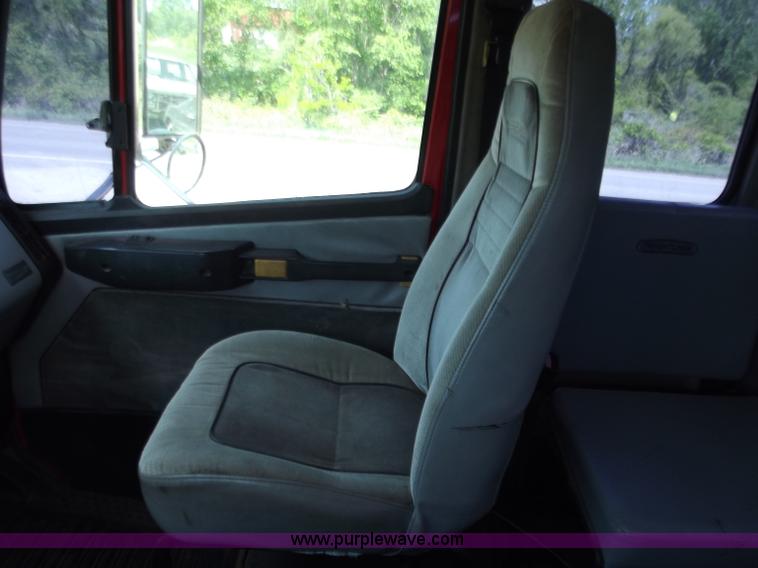 image for item C2014 1998 Freightliner FL60 business class roll back extended cab truck