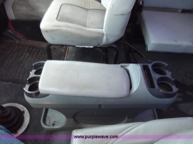 image for item C2014 1998 Freightliner FL60 business class roll back extended cab truck