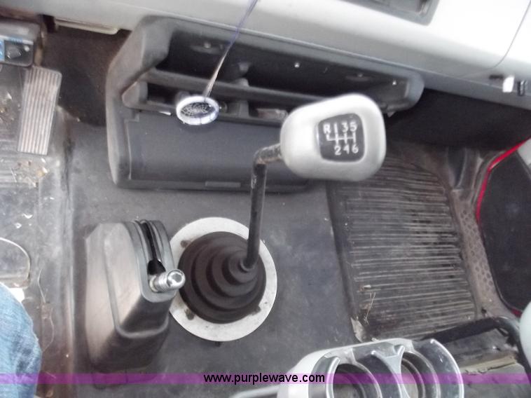 image for item C2014 1998 Freightliner FL60 business class roll back extended cab truck